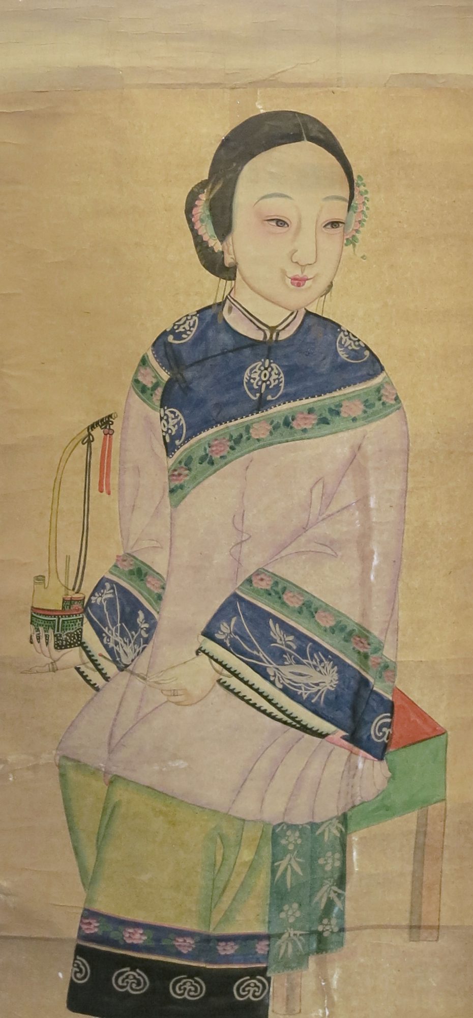Watercolour depicting a Chinese lady holding a smoking pipe in both hands, mounted on scroll